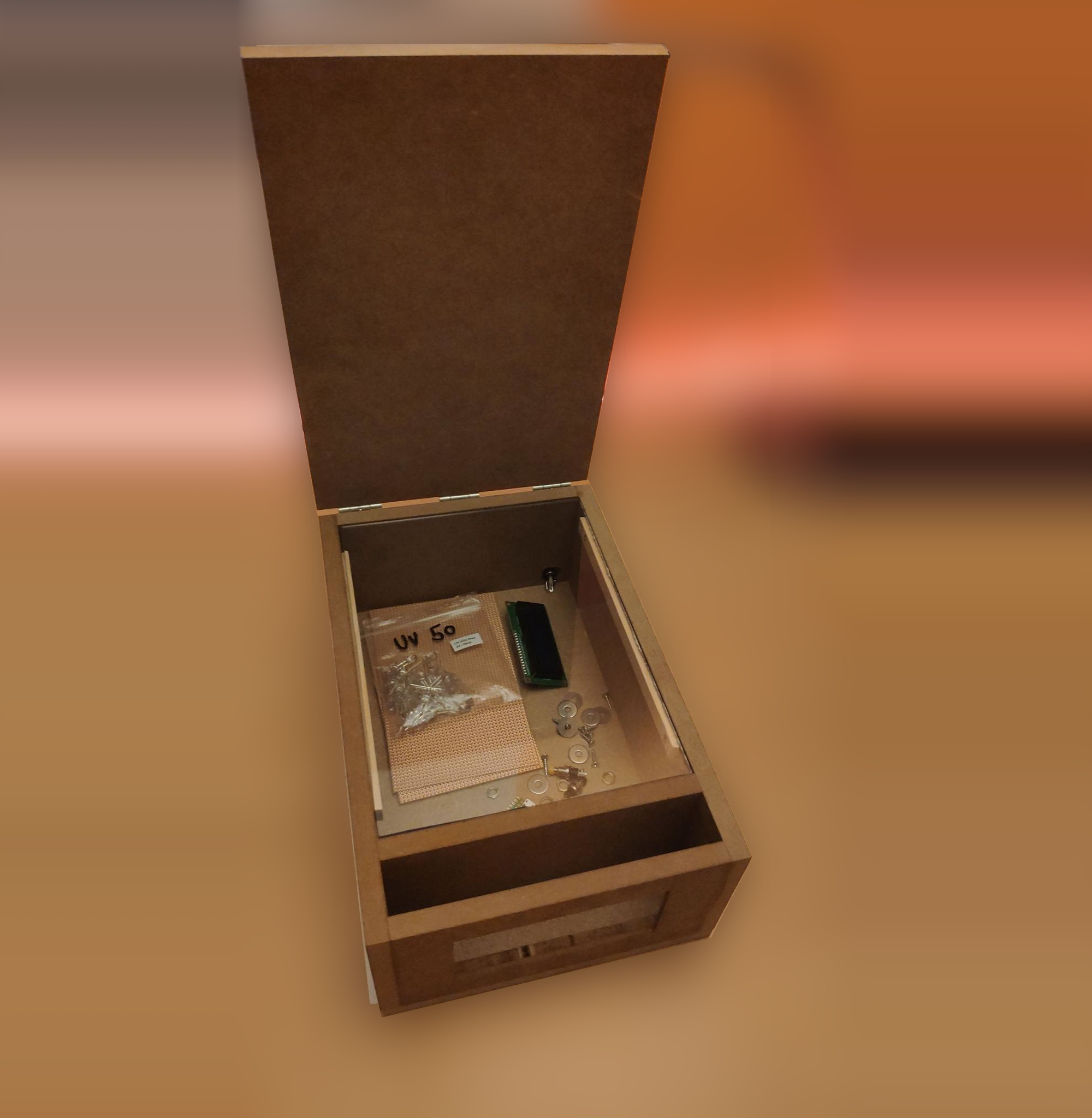 This picture would show the finished housing with acrylic glass pane and some loose components.